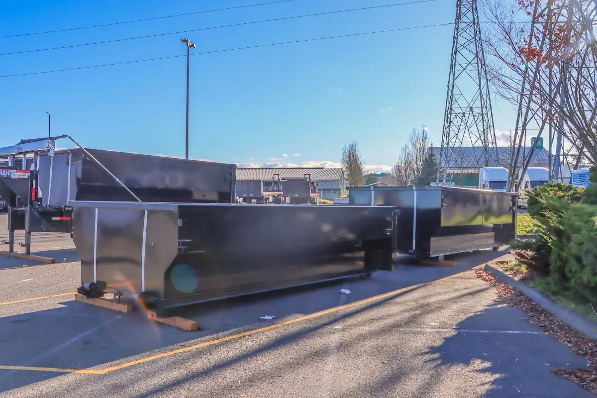 Roll-off dumpster ready for waste disposal at job site for 3 Yard Dumpster Rental in Southern Pines
